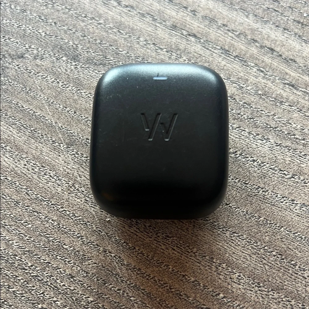 Whoop 4.0 with black band and charger